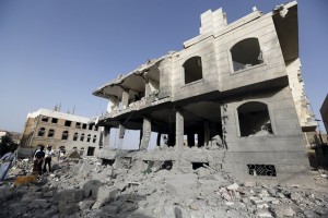 A house destroyed by an air strike is seen in Sanaa April 26, 2015. REUTERS/Khaled Abdullah