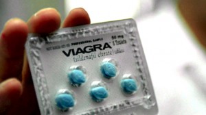A Chinese doctor shows the anti-impotence drug Via