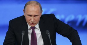 Russian President Putin speaks during his annual end-of-year news conference in Moscow